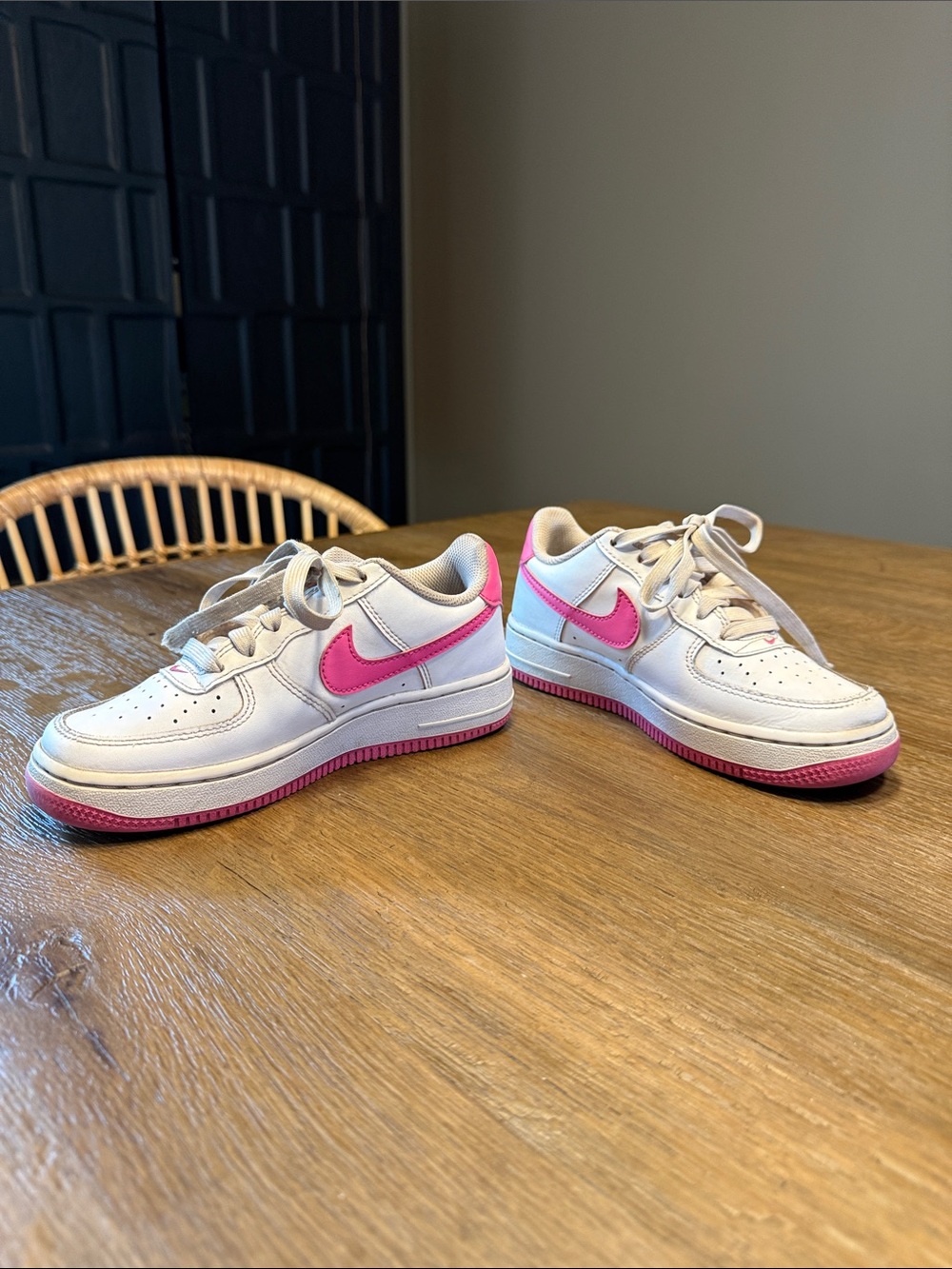 Nike White Low-Top Sneakers with Pink Swoosh and Pink Outsole